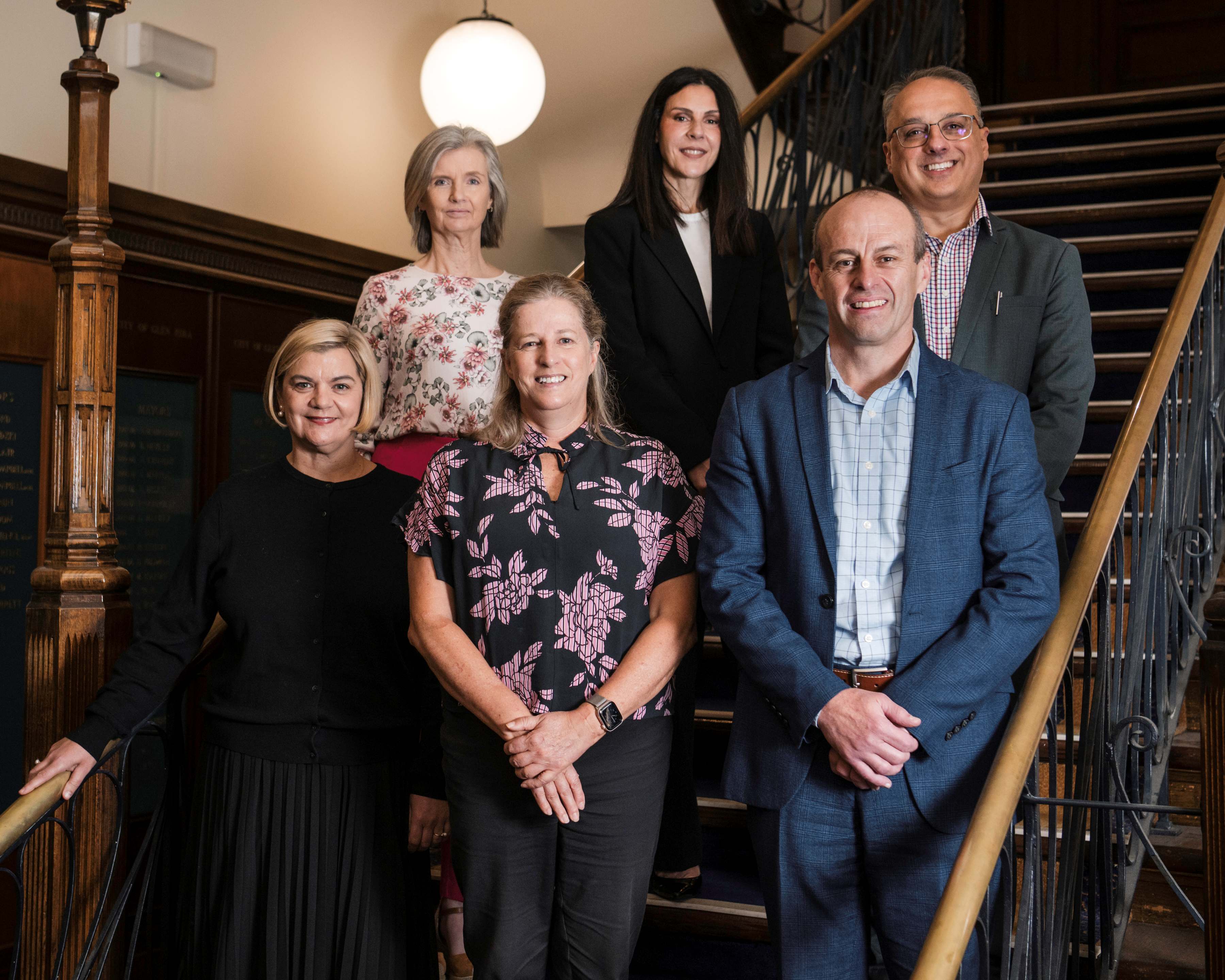 A group of people in corporate clothes